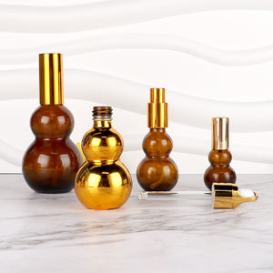 Lustrous-Plated 10ml 100ml Amber <b>Glass</b> Gourd Bottle + Embossing for Patchouli Body Moisturizer - Product Image 1