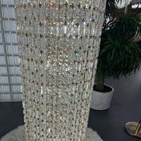 Lustre en cristal cylindrique à tube long, luminaire suspendu vertical personnalisé pour plafond haut, hall d'hôtel, villa, cage d'escalier