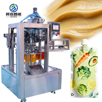 BUNSEN Remplisseuse automatique à 2 buses pour sachets souples préformés à bec verseur, pour sauces, huiles, shampoings, miel