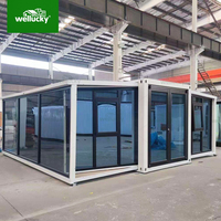 Unité de logement modulaire préfabriquée de 20 pieds et 40 pieds avec murs-rideaux en verre personnalisés, maison conteneur pliable, maison conteneur extensible