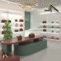 Vitrine de présentation de sacs à main tendance avec éclairage, armoire murale pour sacs, couches personnalisées pour l'affichage en magasin