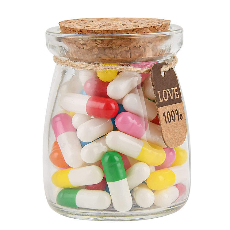 Botella de píldora de cristal clara