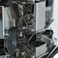Petite machine automatisée de pesage et d'emballage quantitatifs d'aliments pour granules/poudre/riz/noix/thé Peseuse à têtes multiples Machine de remplissage