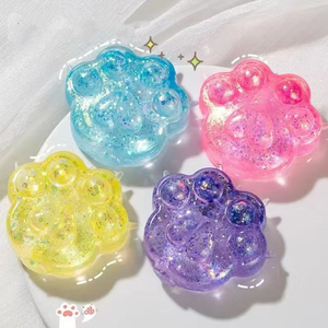 ของเล่นบีบรูปอุ้งเท้าแมวหลากสีสัน ดีไซน์สร้างสรรค์ แปลกใหม่ บรรเทาความเครียด บีบแล้วคืนรูปช้าๆ ของเล่นกลิตเตอร์ สำหรับทุกเพศ ทุกวัย 15 ปีขึ้นไป - Product Image 1