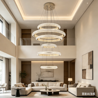 Grand lustre circulaire en cristal LED de luxe pour l'éclairage des escaliers de villas intérieures