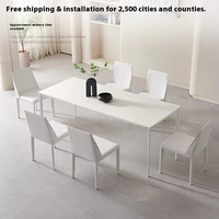 Chaises et table de salle à manger en pierre blanche pure Delifeng minimaliste italienne combinaison de chaises et table de style nordique simple