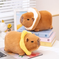 Peluche Capybara Mignonne avec Collier Fleur de Toast, Jouet en Peluche Doux, Poupée Capybara en Peluche, Rongeur Moelleux pour Enfants et Décoration Intérieure