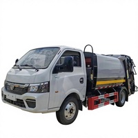 Camion à ordures diesel manuel Dongfeng 5000L avec compacteur hydraulique et fonction de recyclage pour le transport des déchets urbains