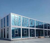 Maisons conteneurs avec façades vitrées : rehausser l'esthétique des espaces de bureau et résidentiels modernes.