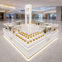 Kiosque de parfumerie lumineux de grande taille, style blanc haut de gamme, en or blanc, personnalisé avec écran TV pour centre commercial