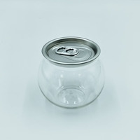 Vente en gros de canettes de boisson sphériques en PET de 200 ml avec logo personnalisé et joint à anneau de traction pour l'emballage de jus et de soda