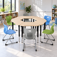 Ensemble de tables scolaires hexagonales modulaires et empilables avec chaises en plastique pour les discussions de groupe en classe
