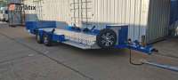 Remorque de transport Blue Beaver Tail Equipment à plateau extra large avec roue de secours, dimensions personnalisées pour le transport de mini-excavatrices et chargeuses