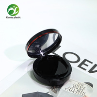 Boîte à coussin d'air ronde noire minimaliste en gros d'usine, emballage cosmétique vide personnalisable OEM/ODM