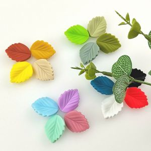 <span class=keywords><strong>ราคา</strong></span>โรงงาน ลูกปัดซิลิโคนรูปใบไม้ ปลอดสาร BPA สำหรับทำจุกนมหลอก สร้อยคอ ของเล่นเด็กกัดเล่น - Product Image 2