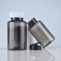 Flacon en plastique PET noir transparent avec bouchon à clapet pour médicaments, vitamines, capsules et compléments alimentaires