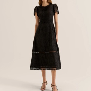 Vestido de mujer de moda con bordado hueco, falda de cintura alta estilo A, vestido bordado elegante y transparente para verano - Product Image 1