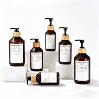 Vente en gros d'emballages cosmétiques vides en PET, flacon pompe cylindrique pour shampoing, logo personnalisé imprimé, marque privée, soin de la peau, sérum capillaire