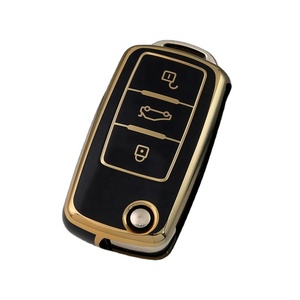 Funda de TPU con Borde Dorado para Llave de Coche Personalizada, Compatible con <span class=keywords><strong>VW</strong></span> Golf, Polo, Tiguan, Passat, Caddy, Funda para Llave Plegable, Bolsa para Control Remoto - Product Image 1