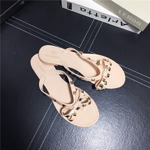 Nouveau européen et américain Clip-On Flip Flop femmes plat polyvalent plage été décontracté mode Stud Bow sandales - Product Image 1