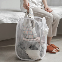 Panier à linge pliable en maille peu encombrant avec poignées pour l'organisation des vêtements