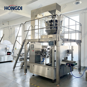 Un peseur combiné à 14 têtes associé à une machine d'emballage de granulés à 8 postes, utilisée pour l'emballage de chips, de noix et de fruits secs. - Product Image 6