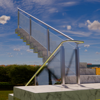 Balustrade en verre sans cadre moderne avec main courante en acier inoxydable pour usage hôtelier, design de balcon intérieur