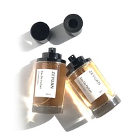Flacon de parfum vide rond transparent de luxe en verre avec couvercle magnétique, 50 ml, 100 ml, à faible MOQ, avec pulvérisateur à sertir pour une bonne diffusion de brume