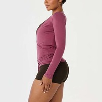 Haut de yoga longue manche 2026 personnalisé pour femme, uni, léger, transparent, style ballet, extensible, réversible, col en V profond, à nouer devant