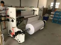 Machine automatique de rembobinage de rubans adhésifs de gros rouleaux en petits rouleaux