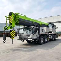 Grue de chantier d'occasion de 100 tonnes, flèche de 60,5 m à 6 sections, châssis 8x4, contrepoids de 23,5 t pour la construction de bâtiments de grande hauteur