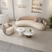 Ensemble de canapés modulaires incurvés de luxe nordique moderne en cuir synthétique confortable pour réception et salon de beauté