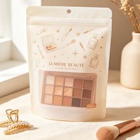 Pochette verticale noire mate à marque privée avec fenêtre transparente personnalisée et trou de suspension refermable pour emballage cosmétique de palette de fards à paupières