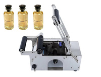 Machine d'étiquetage de bouteilles semi-automatique manuelle de haute précision portable pour les contenants en verre, en plastique, en conserve, en tube, en baume à lèvres