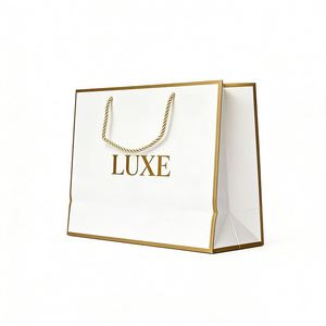 Bolsas de Papel Kraft Reciclado Ecológicas de Lujo Personalizadas al por Mayor con Asas de Cinta para Empaque de Ropa, Reutilizables y Reciclables - Product Image 1