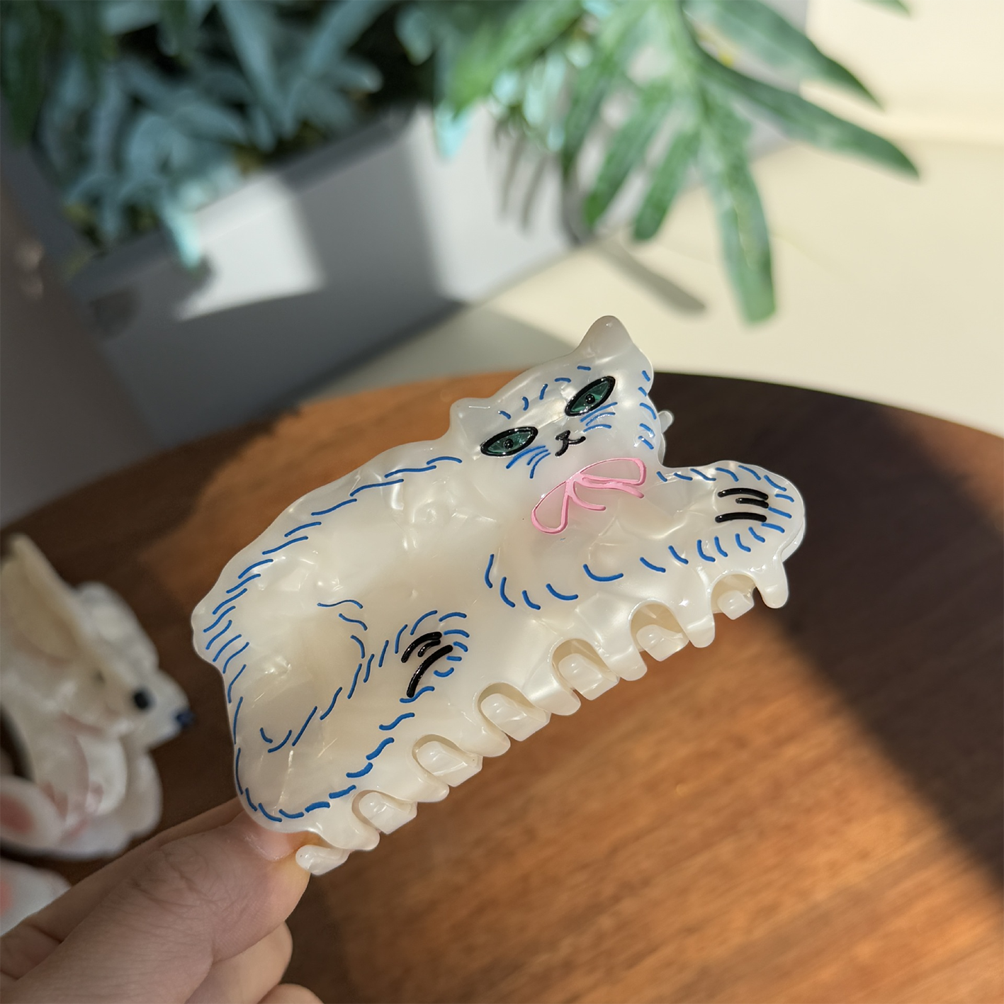 Green-eyed white Persian cat