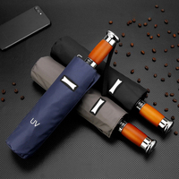 Parapluie pliable automatique classique à 10 baleines, revêtement noir, protection UV, poignée en bois robuste, matériau pongee imperméable