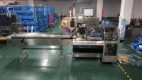 Moteur PLC pneumatique entièrement automatique Film d'emballage alimentaire Oreiller en plastique Boulette Bun Spaghetti Pain Macaron Flow Machine d'emballage