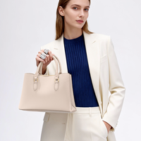 Sac à main en cuir PVC tendance à deux poignées avec doublure en cuir véritable et fermeture éclair, idéal pour les voyages, les affaires et les sorties.