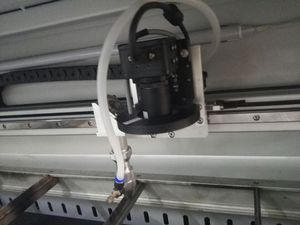 Máquina de corte por láser de posicionamiento CCD SCU1060 para bordado de etiquetas de ropa cortadora láser de impresión Caminal - Product Image 2