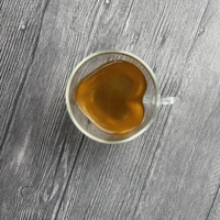 Vente en gros de tasses à café en verre à double paroi en forme de cœur transparent en borosilicate de haute qualité