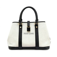 Bolso Tote de Lona de Color Sólido en Cuero Genuino Personalizado SHX - Bolso Tipo Satchel Negro y Blanco con Herrajes Dorados