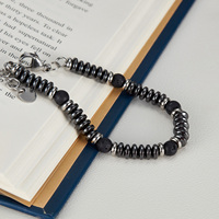 Bracelet de perles noires en acier inoxydable avec pierre volcanique en hématite