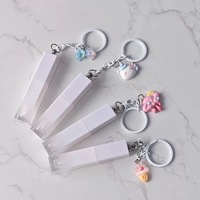 Tube de gloss à lèvres personnalisé avec logo, boîte d'emballage, tube en plastique vide pour gloss à lèvres avec pendentif porte-clés