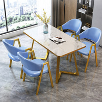 Ensemble de salle à manger moderne en pierre avec table dorée et 4 chaises en métal pour 4 personnes - Vente en gros