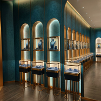 Vitrine murale et sur pied à deux niveaux pour bijoux, cadre or champagne, éclairage LED, pour magasin de diamants