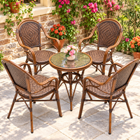 Ensemble bistrot d'extérieur en aluminium avec table ronde en verre et 4 chaises en rotin, mobilier de jardin et de terrasse pour café et cour arrière