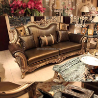 Canapé antique américain en bois sculpté, avec revêtement noir et détails en feuille d'argent, en cuir noir