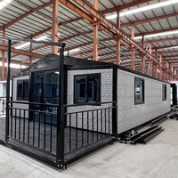 Conteneur magique américain à deux étages Petite maison préfabriquée Paquet plat Île solaire extensible Maison d'hôtel empilable 3 chambres à coucher