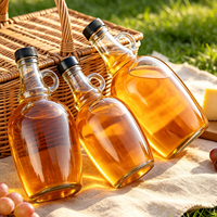 Botella de vidrio vacía al por mayor estilo California de 500ml, 1000ml, 1500ml, 2000ml, 3000ml, 4000ml para whisky, licores y vino con asa